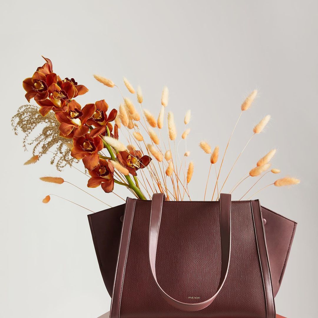Dark coloured bag with dried florals