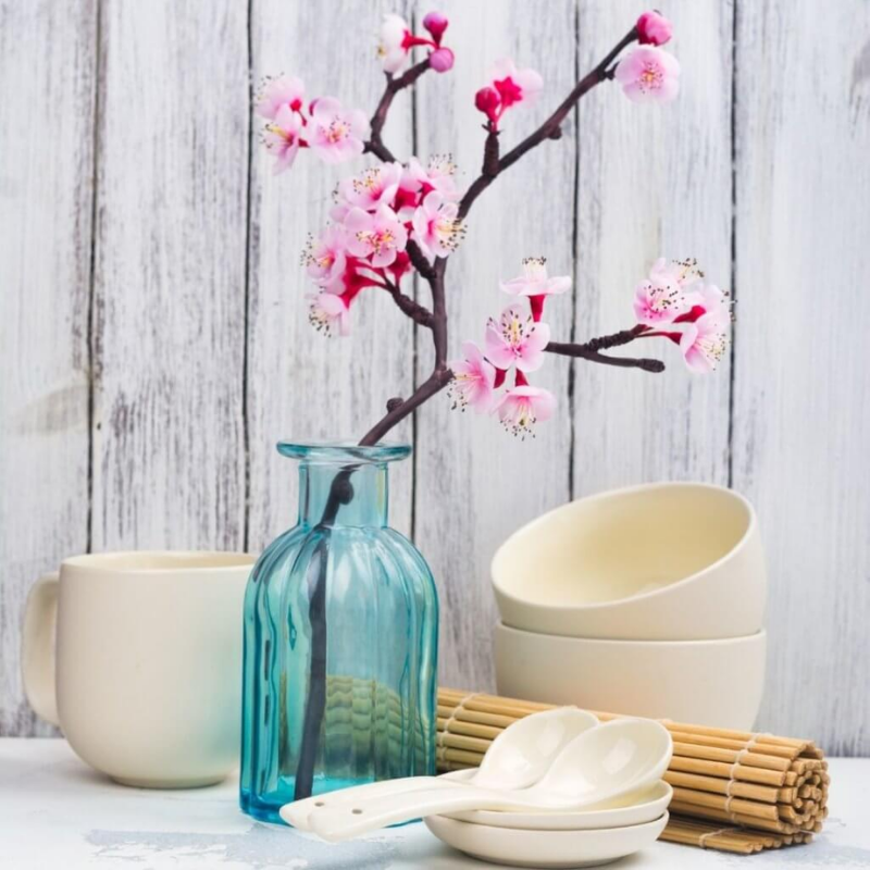 Blue vase with cherry blossom branch