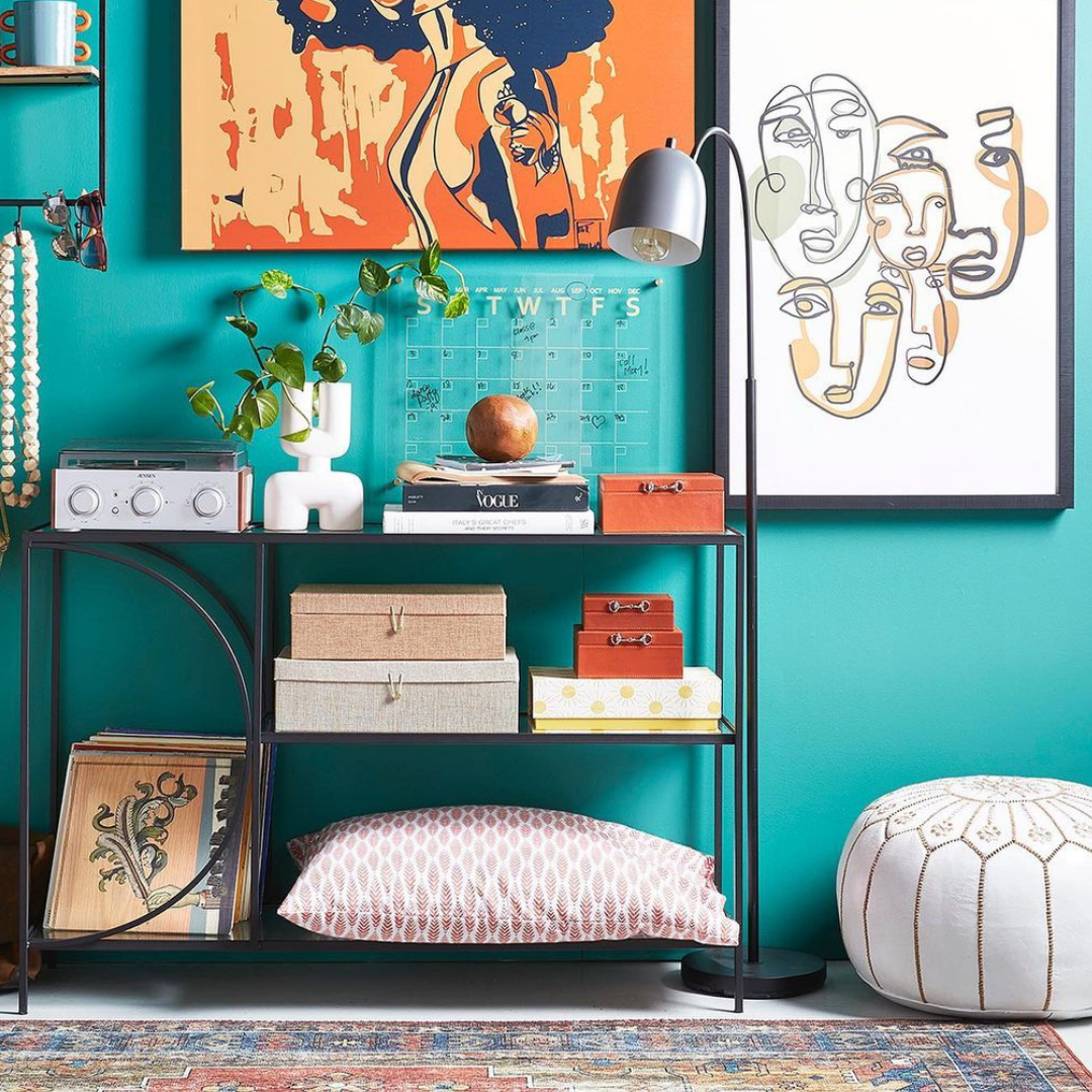 Standing lamp with a colourful backdrop and organized shelf