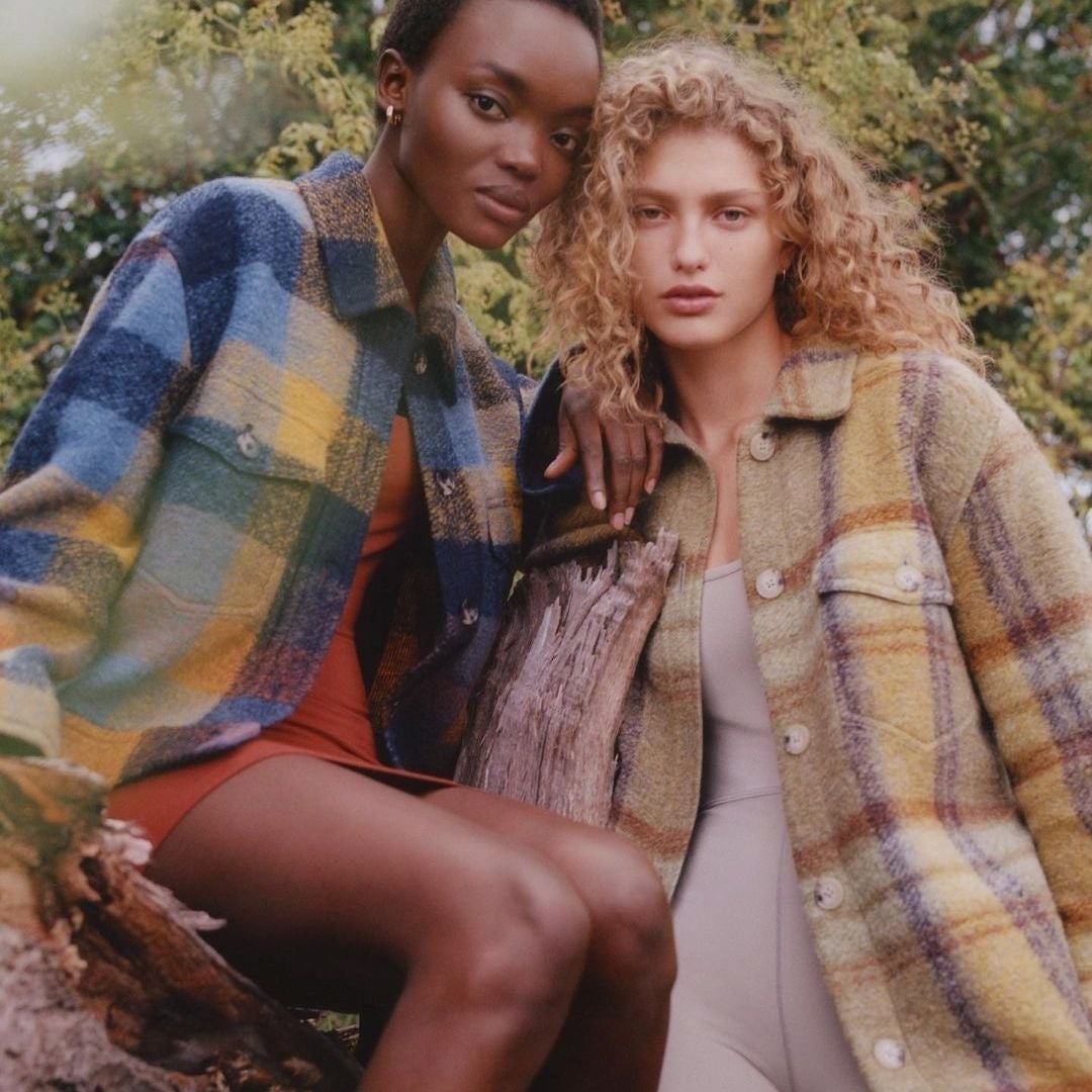 Women wearing plaid shackets