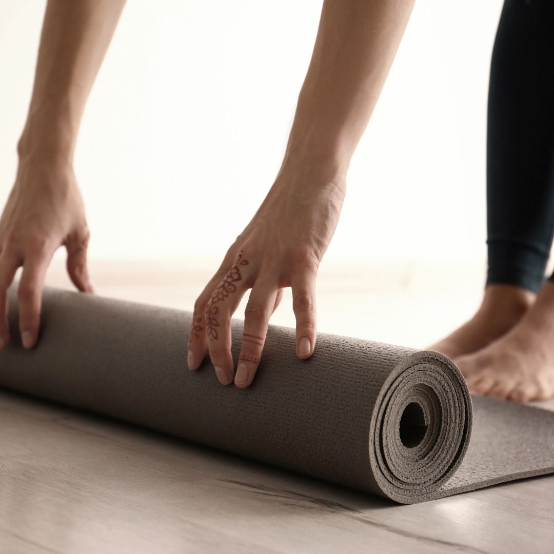 Rolling up a yoga mat
